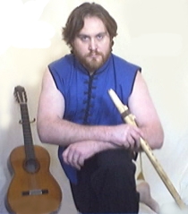 2004 - Hawke beard and shaggy hair, Dr Z & The Synthetic Zen Show, Guitar, Flute, and Kungfu outfit.